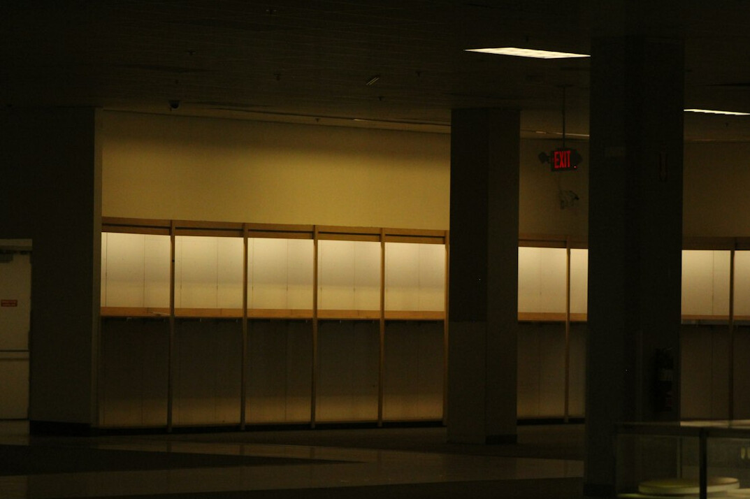 empty store aisle at night